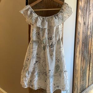 Off the shoulder white dress with detail